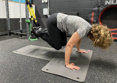 Jane Mackenzie using the TRX Suspension Training System