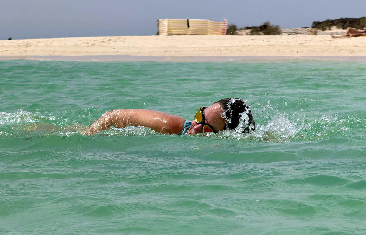 jane-pier-to-pier-british-heart-foundation Jane Mackenzie swimming in the Bournmouth Pier to Pier for the British Heart Foundation.